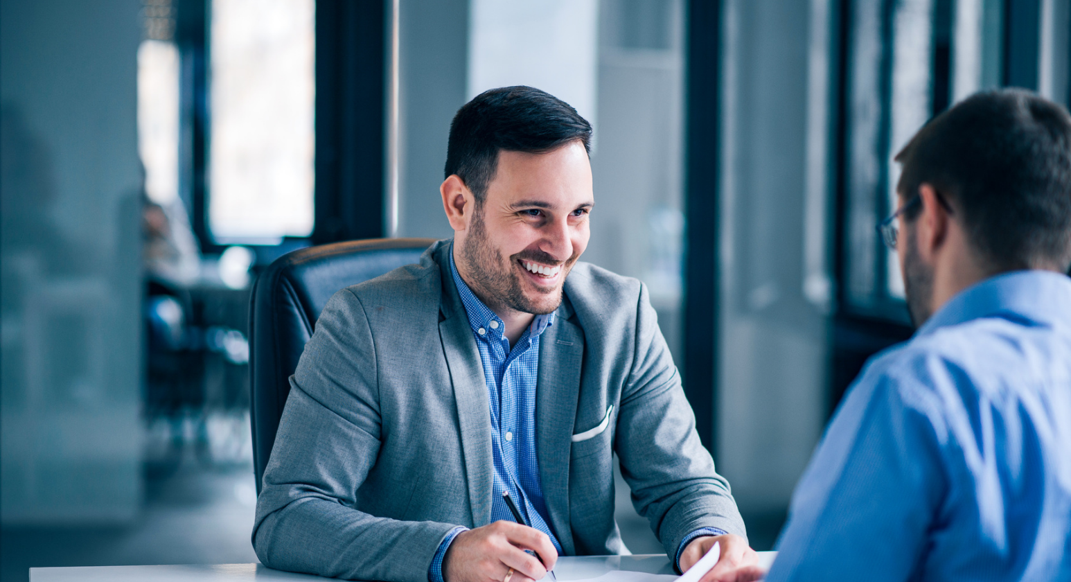 Insurance Agent Explaining Policy Benefits to a Customer